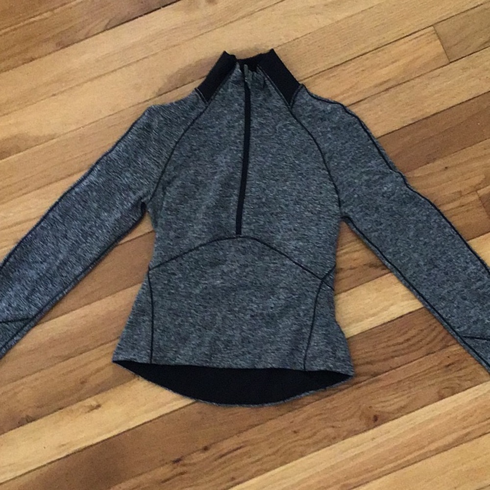 Gray zip up athletic top